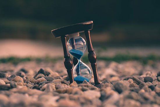 A small hourglass wedged into rocks reminds us that we're close to Christ's return.