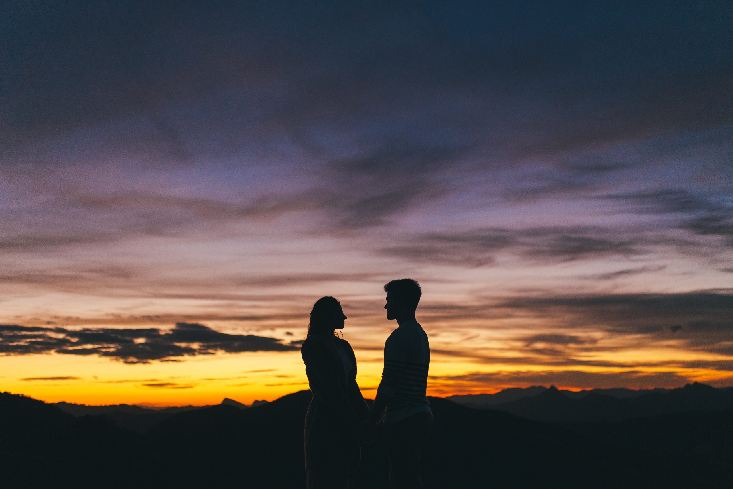 Couple holding hands A couple holding hands in the sunset, reminding us that God made man and woman to reflect the glory of God