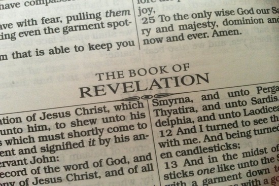 The Book of revelation A close up shot of the title "The Book of Revelation" in the Bible.